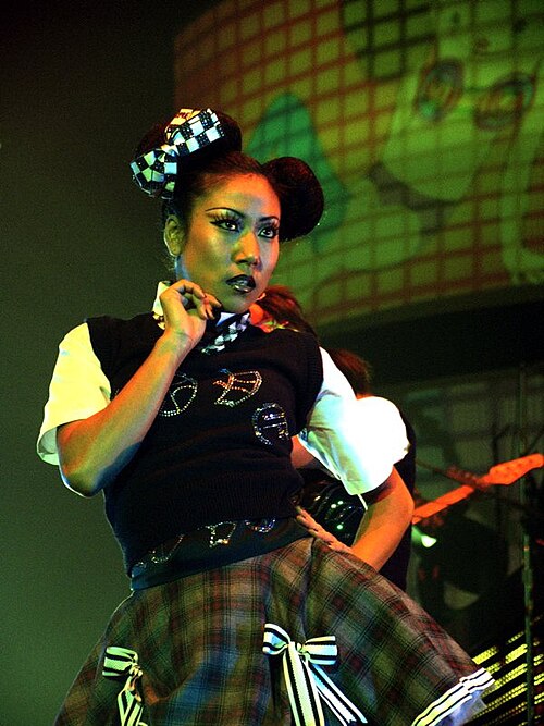 Maya Chino ("Love") during a stage performance of Harajuku Girls