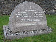 1994 memorial to villagers, in St McCartan's churchyard, Loughinisland, County Down