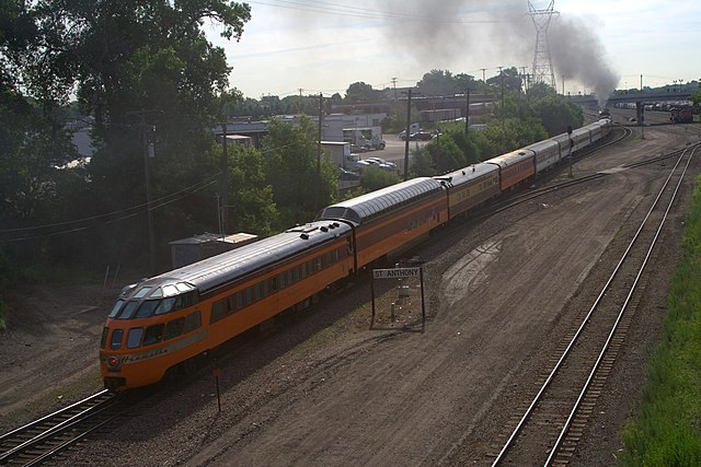 An excursion train pulled by Milwaukee Road 261 with a full-length Super Dome car in 2008