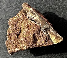 Minette iron ore with belemnite fragment from Rumelange, Luxemburg Minette iron ore.jpg