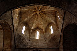 Cimbori vuitavat, amb finestres a cada cara, sobre trompes. Monestir de Vallbona de les Monges (Urgell)