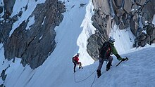 Moving together on Kuffner Ridge (D, UIAA V, French 4c), Mont Maudit. Mont Maudit - Mountaineers on the Kuffner Ridge.jpg