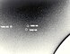 Thalassa (1989 N5) prise par Voyager 2 en 1989 à une distance de 5,9 millions de km. Naïade (1986 N6) et Despina (1989 N3) sont également présent sur l'image. La vitesse orbitale élevée des lunes a causé de faibles stries sur cette photo.