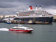 Queen Mary 2 at the new Ocean Terminal, with Isle of Wight passenger ferry Red Jet 3 New Ocean Terminal with Queen Mary 2 - geograph.org.uk - 1577263.jpg