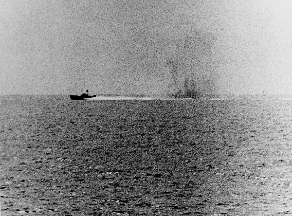 A North Vietnamese P-4 engaging USS Maddox (DD-731) in Gulf of Tonkin incident 1964