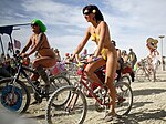 Thumbnail for File:Nude cycling females at Burning man 2009.jpg