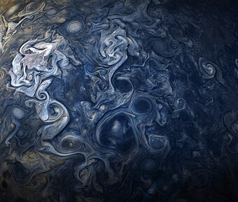 Jovian clouds in striking shades of blue as captured by NASA’s Juno spacecraft