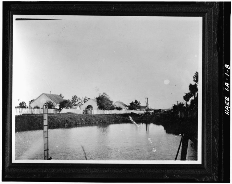 File:Photocopy of c. 1906 photograph looking S over mill pond showing row of creole workers' houses in background. - Laurel Valley Sugar Plantation, State Route 308, Thibodaux, HAER LA,29-THIB,1-8.tif