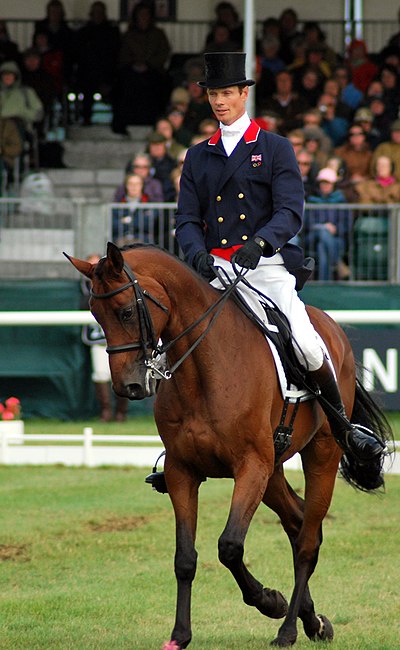 William Fox-Pitt performing a half-pass in a dressage test at an event