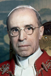 Pius XII with tabard, by Michael Pitcairn, 1951 (cropped2).png