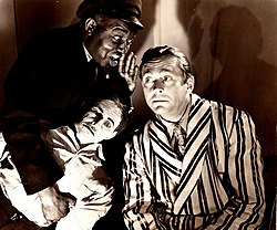 Sam McDaniel, James Dunn, and a dummy in a scene from the film