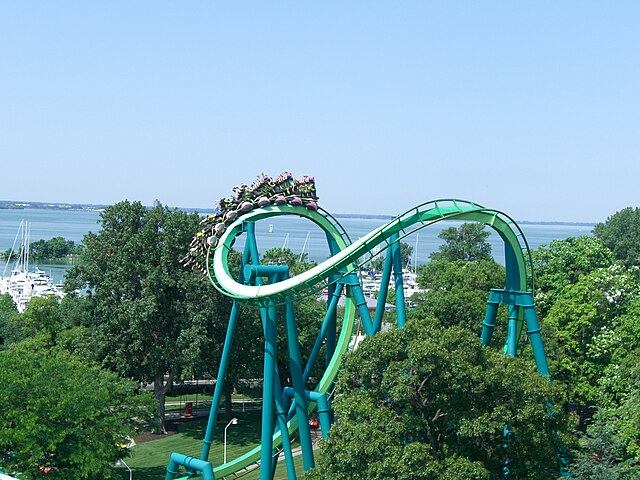 Raptor's cobra roll, a first for inverted roller coasters