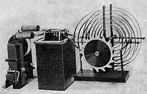 Black and white photograph depicting an old radio transmitter.