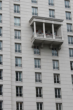 Balcony stands out in a monotonous facade in Buenos Aires