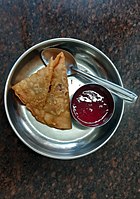 Samosa with tomato ketchup available at Indian coffee houses in Kerala