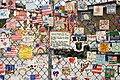 Image 2 Memorials and services for the September 11 attacks Photo credit: David Iliff A collection of hand-painted tiles adorns this fence in Greenwich Village in Manhattan as a memorial for the attacks of September 11, 2001. Recurring themes within these pieces of art include world peace, American patriotism, and appreciation of the heroism of the FDNY and NYPD. More selected pictures