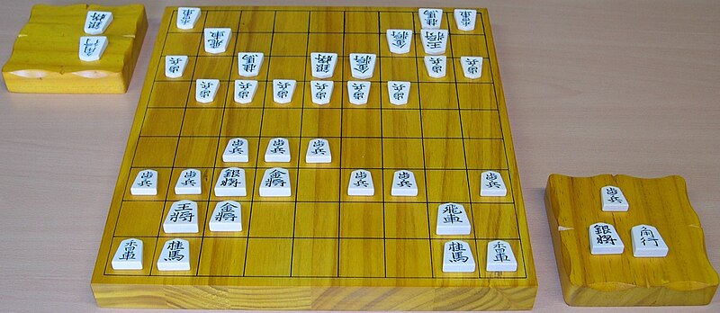File:Shogi board pieces and komadai.jpg