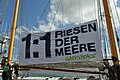 Die Beluga II der Organisation Greenpeace am 11. Juli 2013 im Hafen von Stralsund. Banner "1:1 Riesen der Meere", der Titel einer Ausstellung im Ozeaneum Stralsund, die von Greenpeace unterstützt wird.