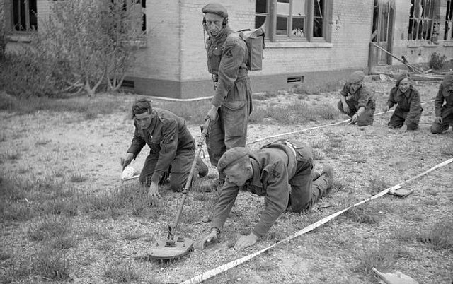 British Army sappers clearing a beach front in Normandy (1944)