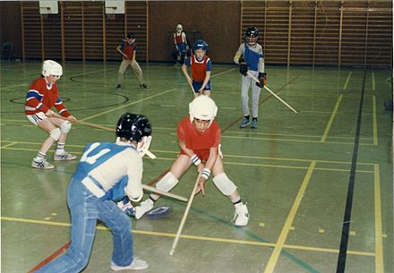 Play action in the spring of 1986 during a floor hockey game, part of a tournament for Cub Scouts held in Cap-Rouge, Quebec City, 50 years after Sam Jacks codified its first set of rules.