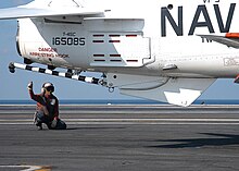 The tailhook of a T-45 US Navy 040918-N-3986D-023 A final checker assigned to the Training Air Wing One (TW-1) gives thumbs up for safe launch of a T-45A Goshawk.jpg
