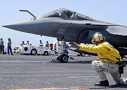 Dassault Rafale M of the French Naval Aviation aboard the aircraft carrier USS Theodore Roosevelt (CVN 71) during combined French and American carrier qualifications