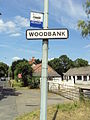 Woodbank sign and bus stop, A540 Parkgate Road - DSC06490.JPG