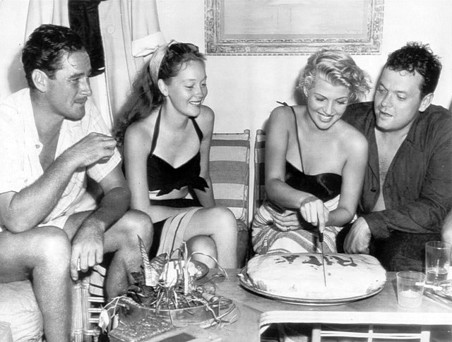 Aboard the Zaca, Errol Flynn, Nora Eddington, Rita Hayworth and Orson Welles celebrate Hayworth's 28th birthday (October 1946)