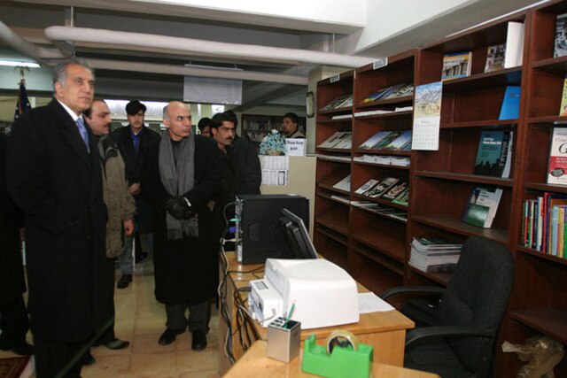 Zalmay Khalilzad and Ashraf Ghani visiting Kabul University in 2005