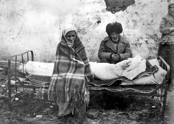 An Ingush family mourning the death of their daughter in Kazakhstan