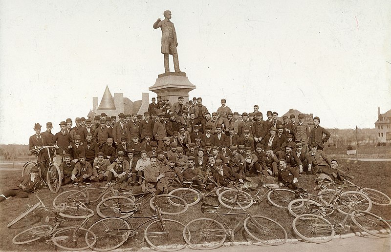 File:1892 Bicyclists pose near Frank Blair statue, Forest Park, St Louis. MoHIST PHO 10223 (cropped).jpg