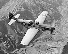 P-51C-10-NT Mustang 42-103896 311th Fighter Group, 14th Air Force Mustang escorting C-47's over China on 24 July 1945 311th Fighter Group P-51 Mustang.jpg