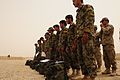 Afghan National Security Forces (ANSF) students graduating from an explosive hazard reduction course at Kandahar Airfield, Afghanistan, stand in formation to receive their certificates of completion June 5 120605-N-LT973-460.jpg