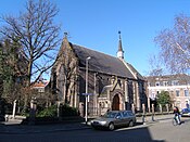 De Holy Trinity Church aan het Van Limburg Stirumplein.[4]