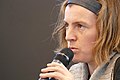 * Nomination The American-born German writer Ann Cotten at the event Fokus Lyrik in Frankfurt 2019 --Kritzolina 12:37, 24 March 2019 (UTC) * Decline In a portrait, at least one of the eyes should be sharp. I dont think that's fixable - sorry. --PtrQs 23:28, 24 March 2019 (UTC)