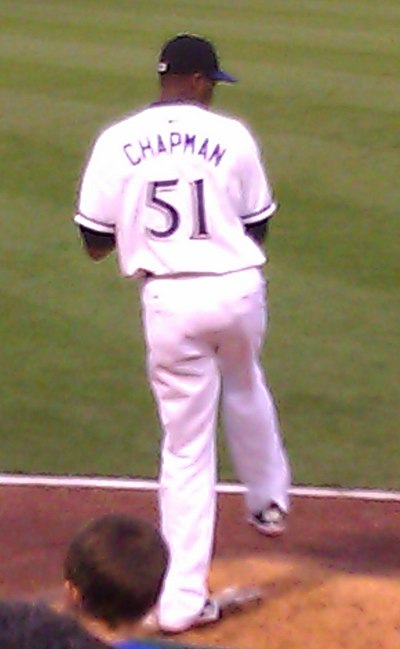 Chapman pitching in the bullpen with the Louisville Bats, triple-A affiliates of the Reds, in 2011