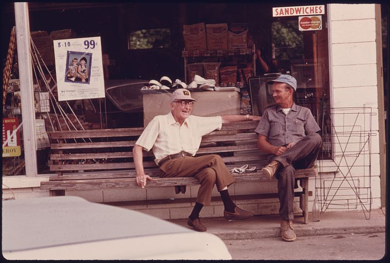 File:BENCH OUTSIDE THE H.C. JOHNSON GROCERY AND SERVICE STATION HOLDS RESIDENTS OF ROBERTSTOWN, GEORGIA, ONE MILE... - NARA - 557767.jpg