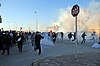 Protesters fleeing after security forces fired tear gas on a march in Nuwaidrat.