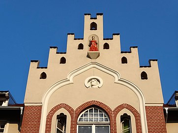 Details of the sculptures on the crow-stepped gable