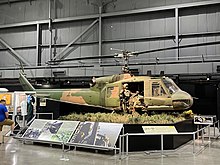 UH-1P preserved in diorama at the National Museum of the Air Force Bell UH-1P-BF (5-19-2022).jpg