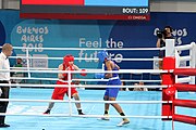 Deutsch: Boxen bei den Olympischen Jugendspielen 2018 Tag 12, 18. Oktober 2018 - Finale Leichtgewicht Mädchen – Junioren-Weltmeisterin und dreifache Juniorinnen-Europameisterin Caroline Sara DuBois (Großbritannien, blau) schlägt Juniorinnen-Asienmeisterin Porntip Buapa (Thailand, rot). English: Boxing at the 2018 Summer Youth Olympics on 18 October 2018 – Girls' lightweight Gold Medal Bout – Caroline Sara DuBois (Grat Britain, blue) wins over Porntip Buapa (Thailand, red). Español: Boxeo en los Juegos Olímpicos Juveniles de Verano de 2018 en 18 de octubre de 2018 - Combate de medalla de oro de peso ligero para niñas - Caroline Sara DuBois (Gran Bretaña, azul ) gana sobre Porntip Buapa (Tailandia, rojo).