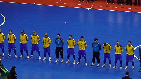 The Brazil national futsal team line up before a match.