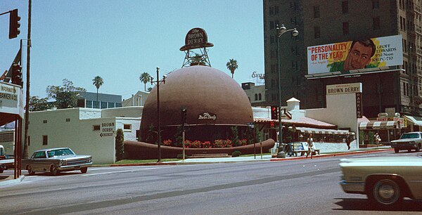 Billboard announcing Geoff Edwards' radio program on KMPC (behind Brown Derby restaurant on Wilshire Blvd.), circa 1968.