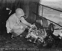 USS Suwannee after the kamikaze attack from 25 October 1944. Parts of the A6M5 Zero's Nakajima Sakae 21, 14-cylinder radial engine were found in the vicinity of the hit. Cylinder heads are destroyed, connecting rods and crankshaft are visible.