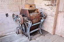 A late 19th century double roller mill displayed at Cook's Mill in Greenville, West Virginia in 2022 Cook's Mill machinery 2022b.jpg