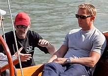 Craig with producer Michael G. Wilson in June 2006, filming Casino Royale Daniel Craig on Venice yacht crop w Wilson b.jpg