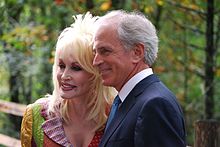 With Tennessee Senator Bob Corker at the rededication ceremony for the Great Smoky Mountains National Park in September 2009 Dolly Parton and Bob Corker.jpg