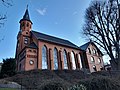 Kirche mit angebautem Pfarrhaus einer evangelisch-freikirchlichen Gemeinde (Baptisten)
