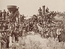 Golden Spike photo East and West Shaking hands at the laying of last rail Union Pacific Railroad - Restoration.jpg