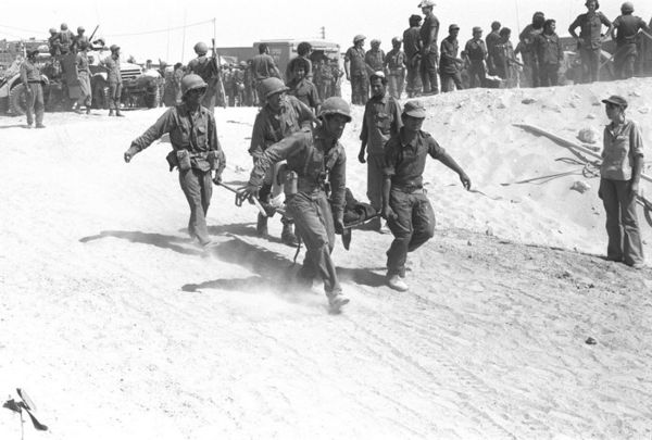 An IDF medical crew evacuating an injured soldier from the battle field during the Yom Kippur War. The Israel Defense Forces suffered 2,565 fatalities